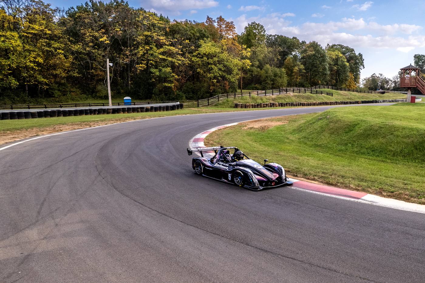 Brent Lillard's Radical coming through a corner on track
